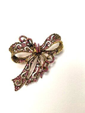 Gold-Tone Filigree Bow Brooch With Pink Rhinestones